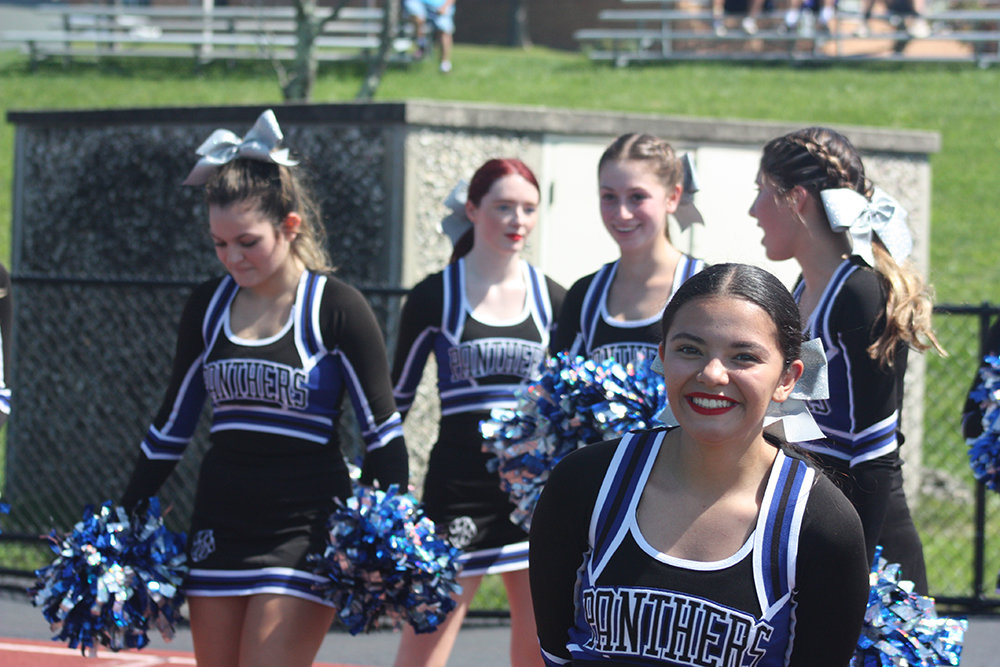 Wallkill cheerleaders celebrate a season-opening victory.